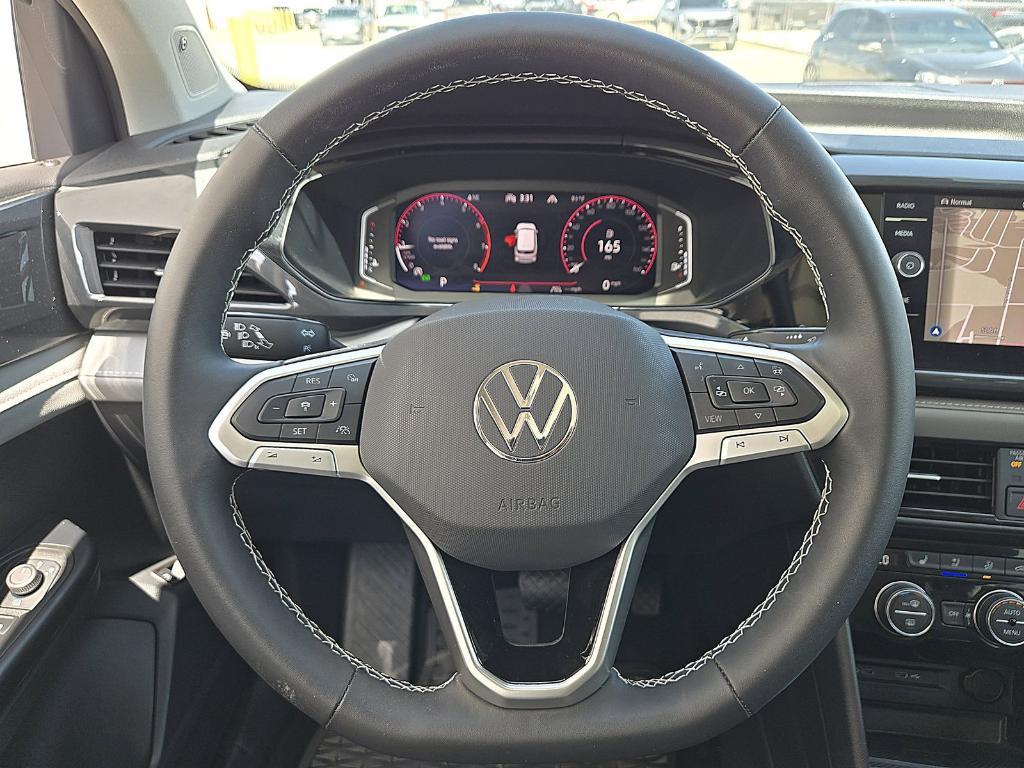 new 2024 Volkswagen Taos car, priced at $27,053