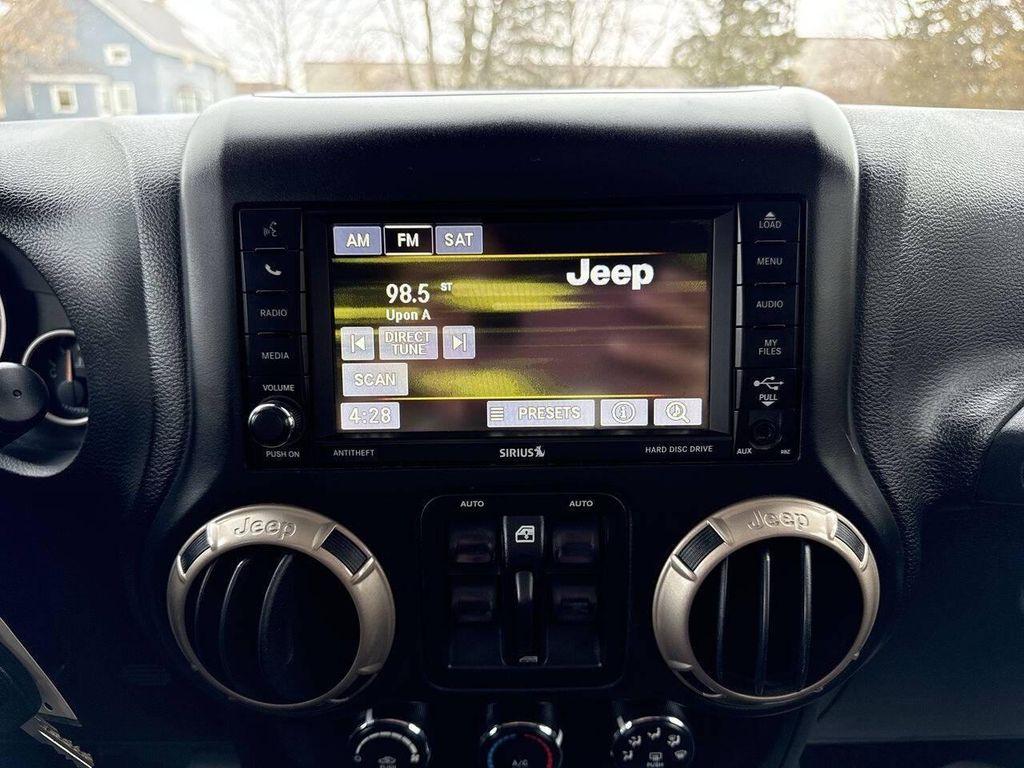 used 2016 Jeep Wrangler Unlimited car, priced at $16,995