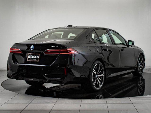 new 2026 BMW 550e car, priced at $85,035