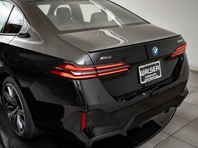 new 2026 BMW 550e car, priced at $85,035