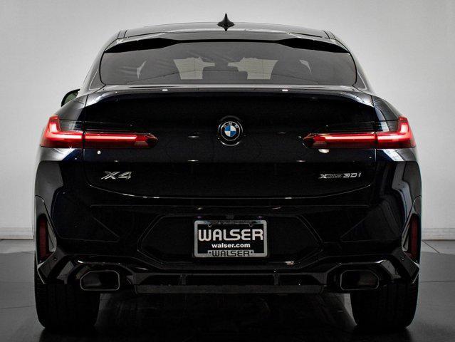 used 2025 BMW X4 car, priced at $51,598