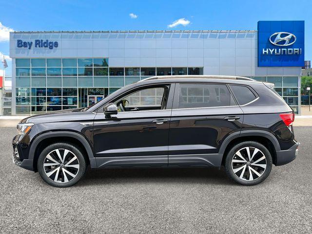 used 2023 Volkswagen Taos car, priced at $25,070