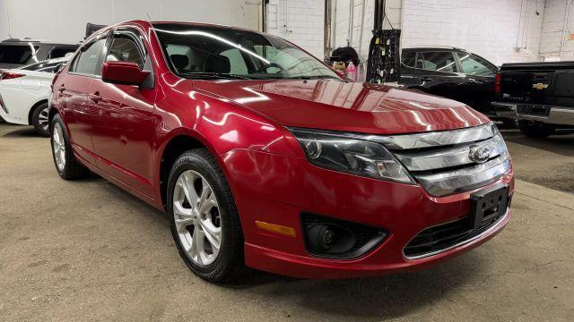 used 2012 Ford Fusion car, priced at $5,499