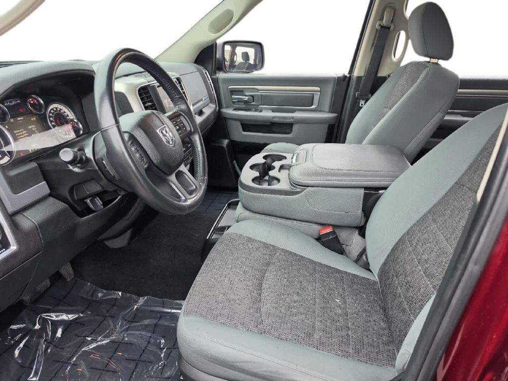 used 2018 Ram 1500 car, priced at $23,179