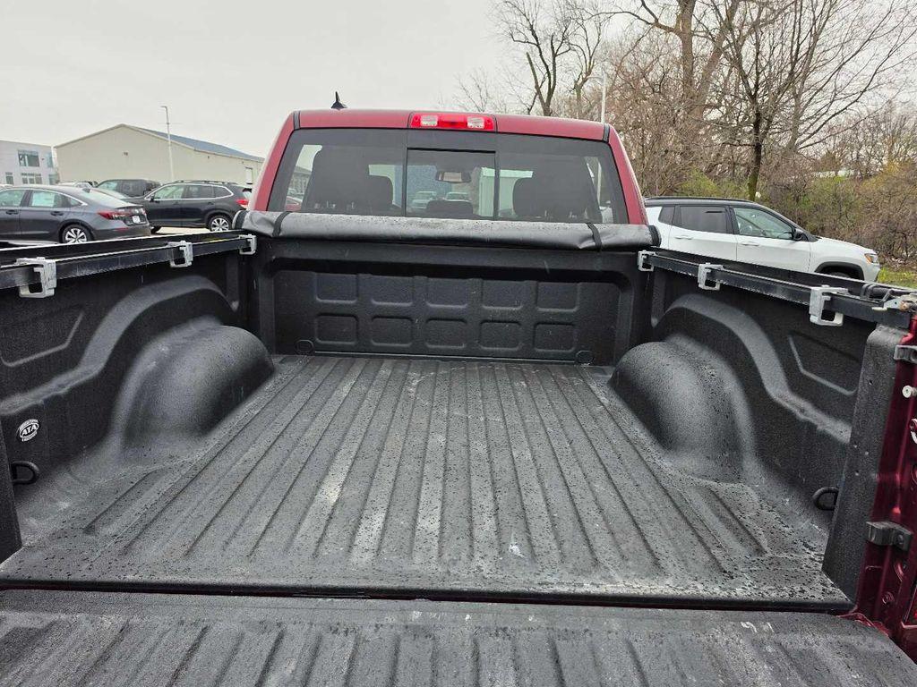 used 2018 Ram 1500 car, priced at $23,179