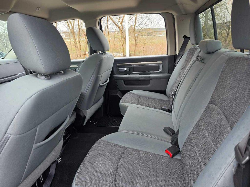 used 2018 Ram 1500 car, priced at $23,179