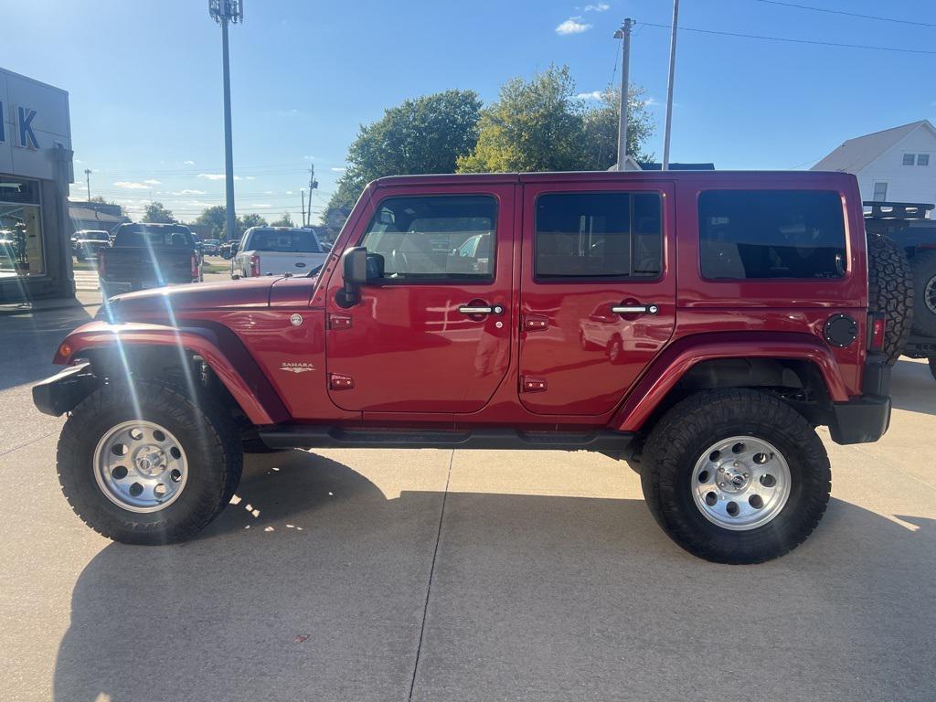 used 2013 Jeep Wrangler Unlimited car, priced at $18,798