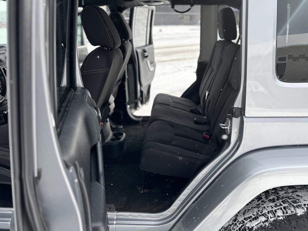 used 2013 Jeep Wrangler Unlimited car, priced at $13,769