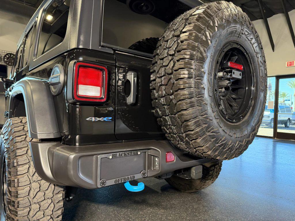 used 2024 Jeep Wrangler 4xe car, priced at $33,990