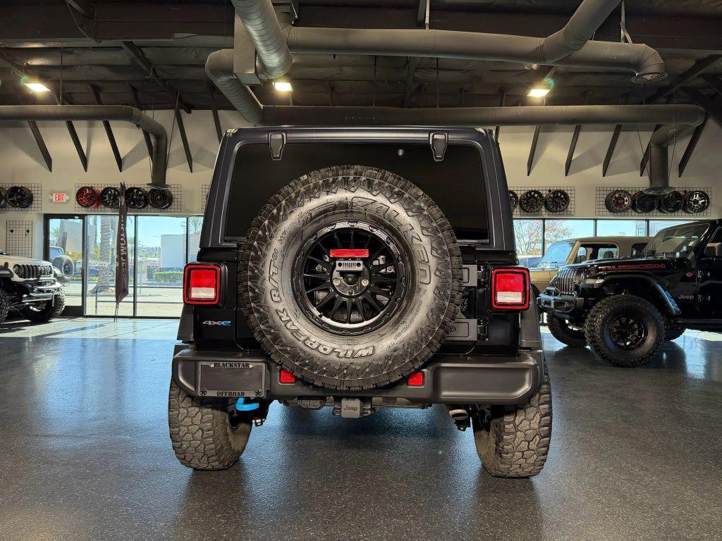 used 2024 Jeep Wrangler 4xe car, priced at $33,990