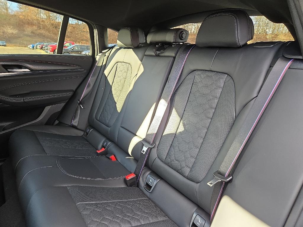 new 2025 BMW X4 M car, priced at $95,925