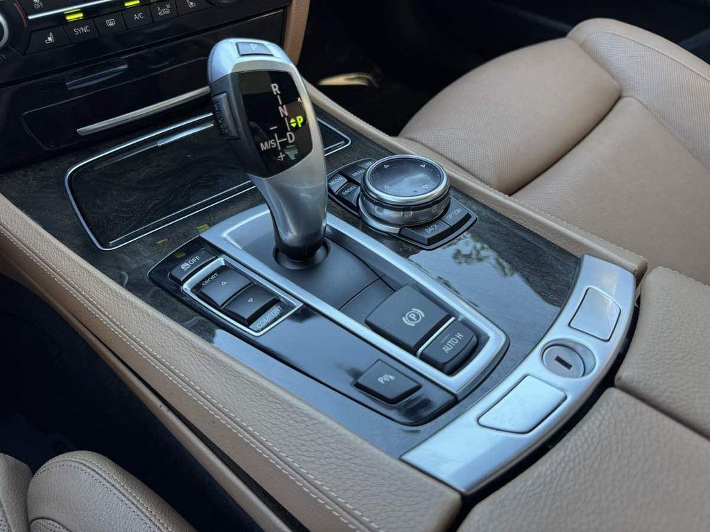 used 2014 BMW 740 car, priced at $15,995