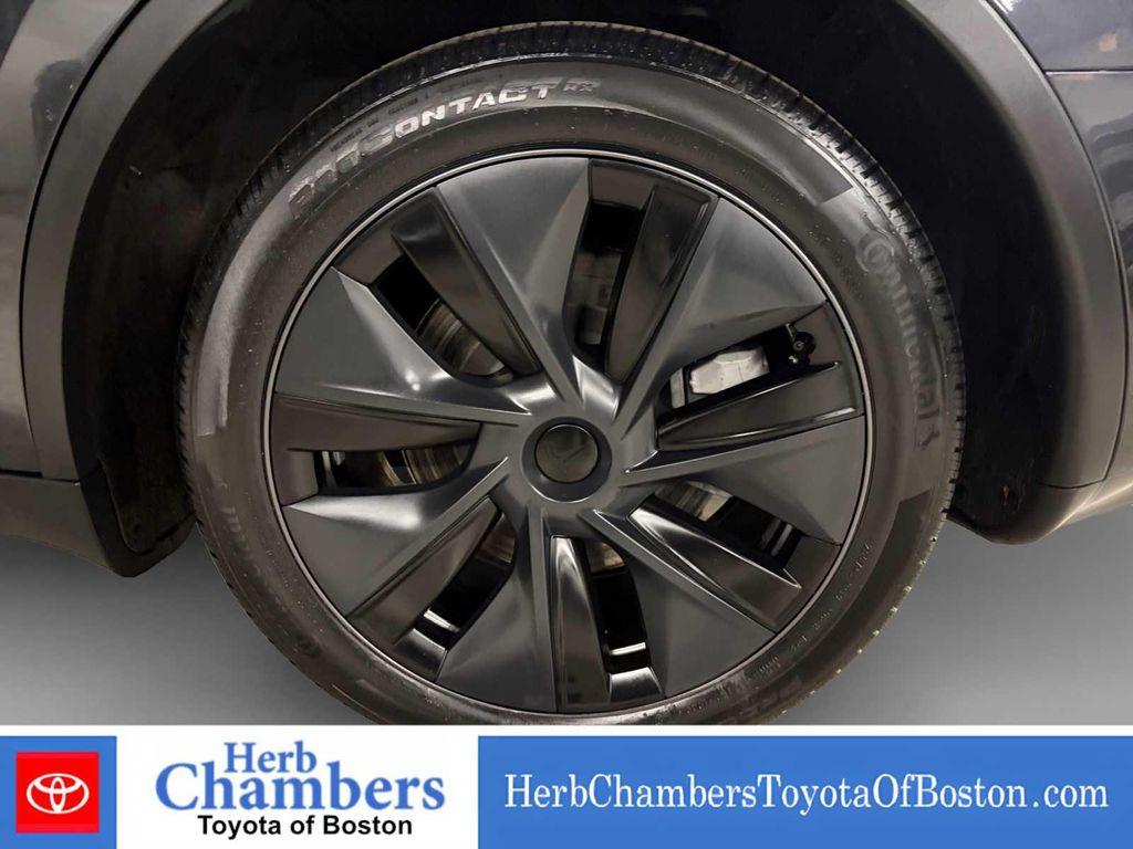used 2025 Tesla Model Y car, priced at $40,560