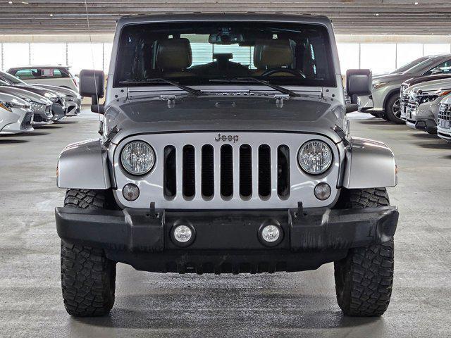 used 2015 Jeep Wrangler Unlimited car, priced at $19,496