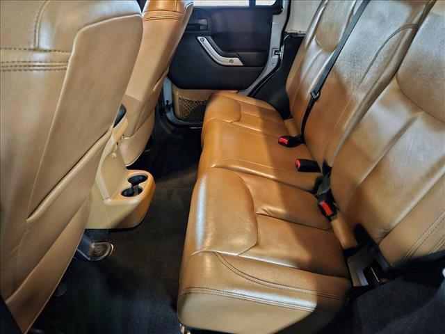 used 2015 Jeep Wrangler Unlimited car, priced at $19,496