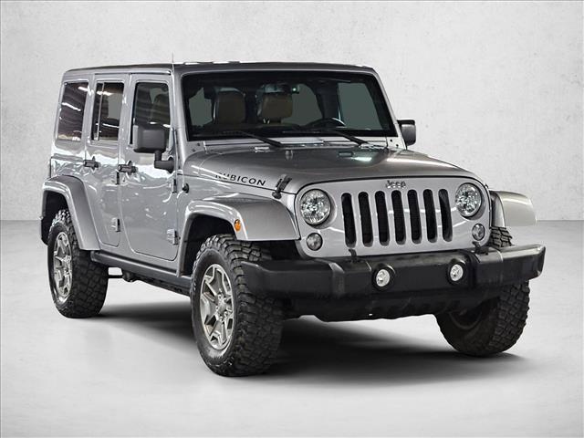 used 2015 Jeep Wrangler Unlimited car, priced at $19,496