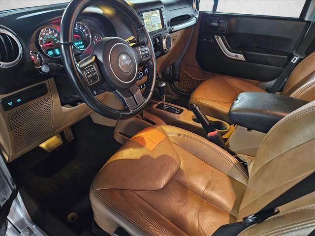 used 2015 Jeep Wrangler Unlimited car, priced at $19,496