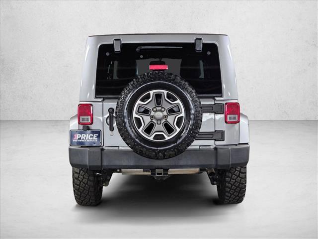used 2015 Jeep Wrangler Unlimited car, priced at $19,496