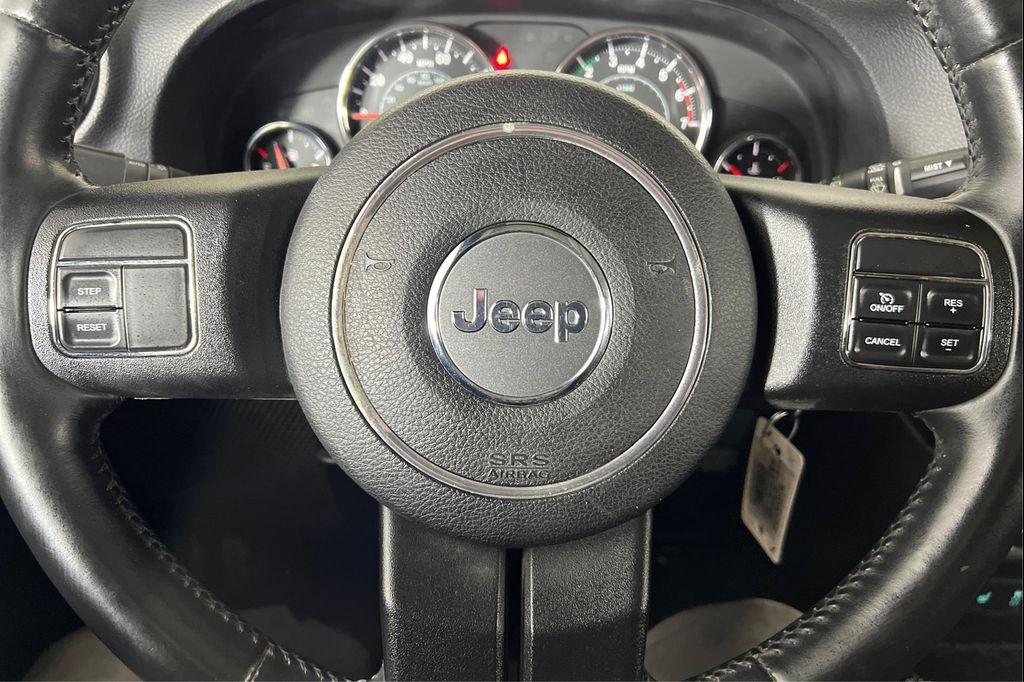used 2012 Jeep Wrangler Unlimited car, priced at $18,995