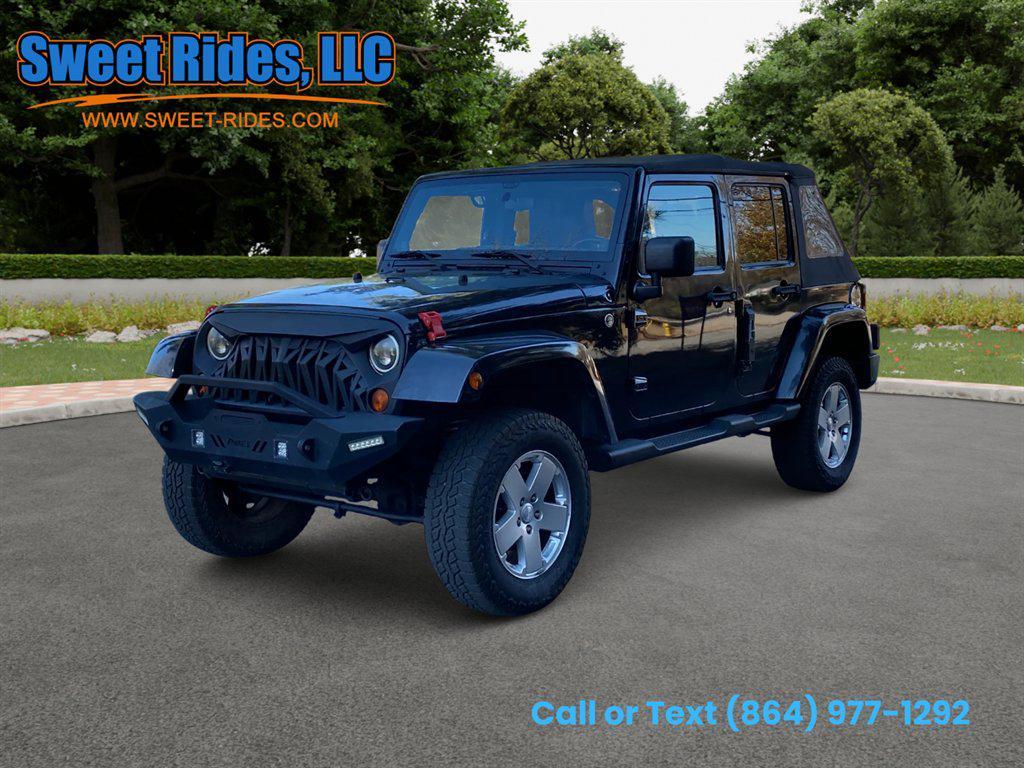 used 2011 Jeep Wrangler Unlimited car, priced at $14,995