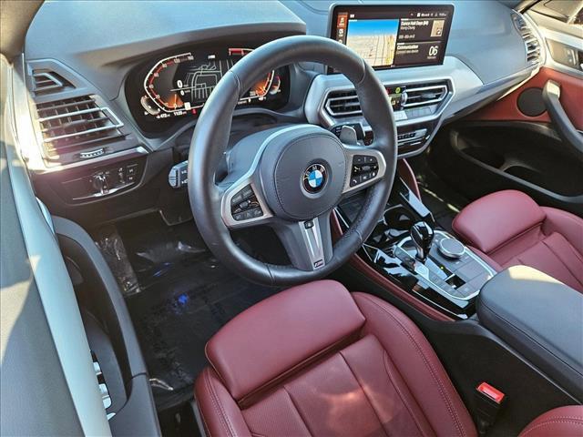 used 2025 BMW X4 car, priced at $49,995