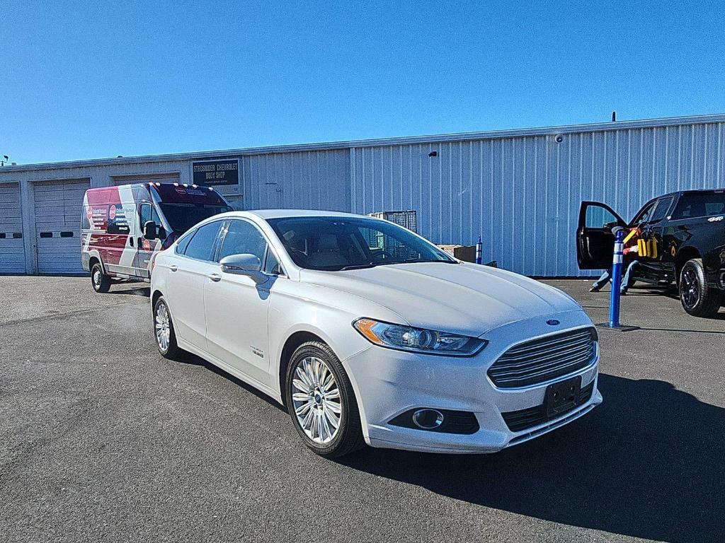 used 2015 Ford Fusion Energi car, priced at $7,500