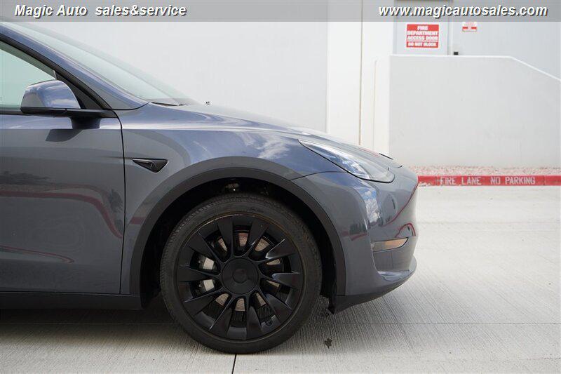 used 2023 Tesla Model Y car, priced at $27,990