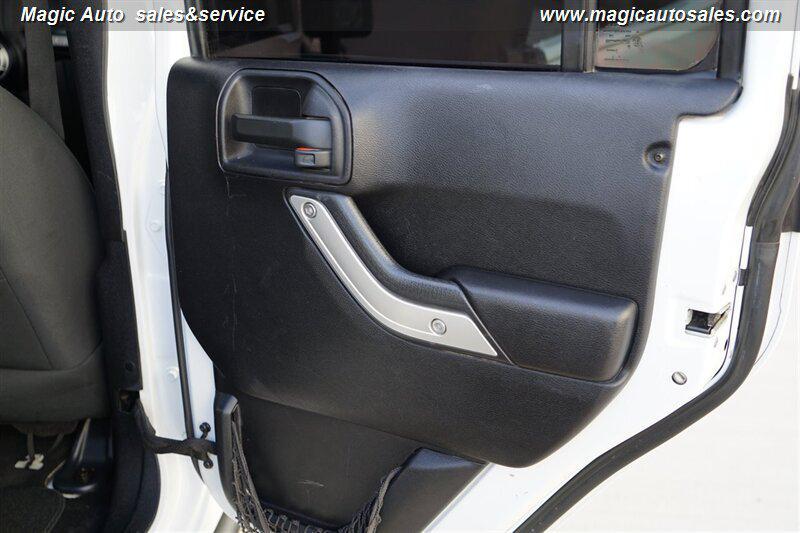 used 2012 Jeep Wrangler Unlimited car, priced at $13,990