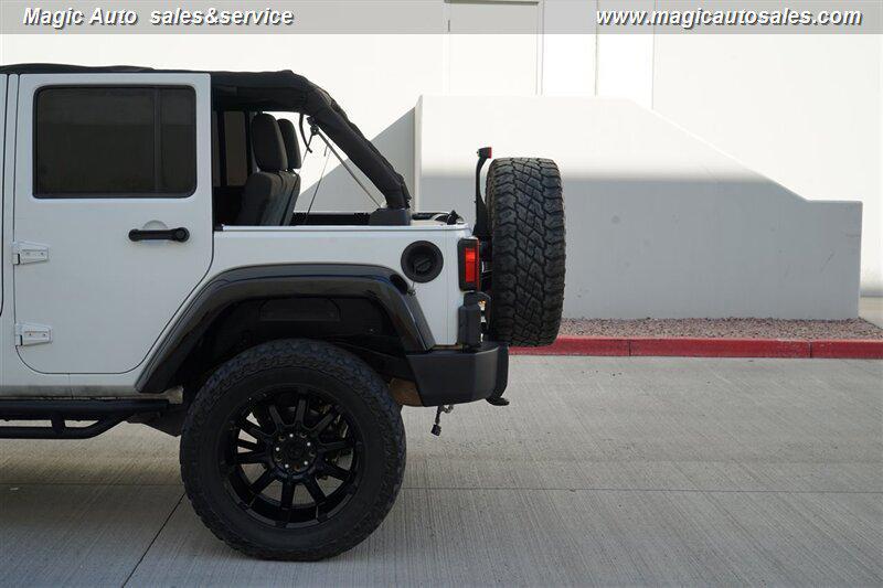 used 2012 Jeep Wrangler Unlimited car, priced at $13,990