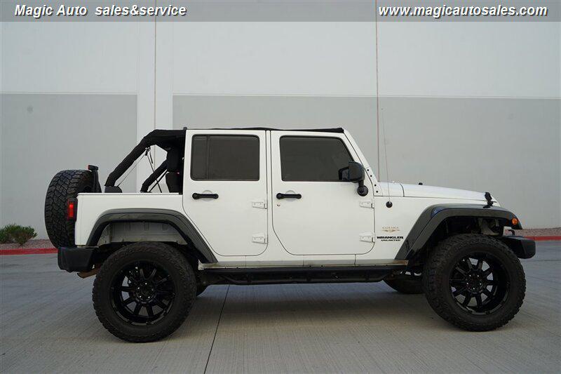 used 2012 Jeep Wrangler Unlimited car, priced at $13,990