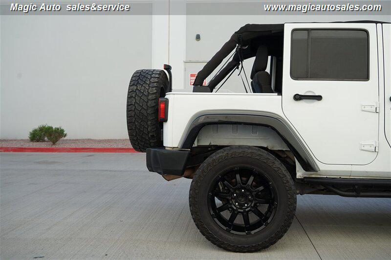 used 2012 Jeep Wrangler Unlimited car, priced at $13,990