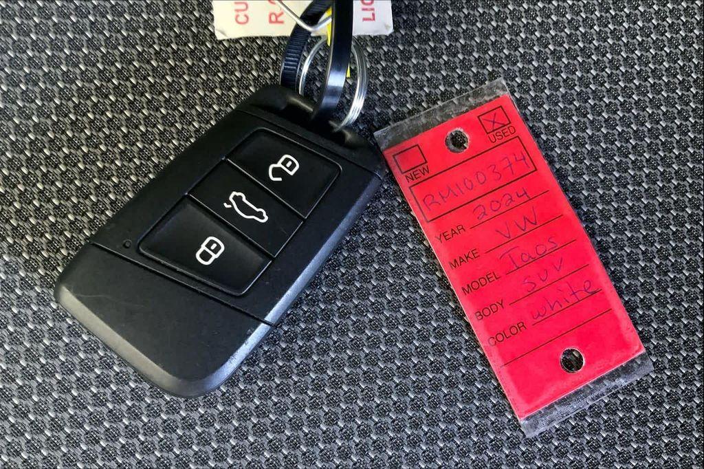 used 2024 Volkswagen Taos car, priced at $21,592