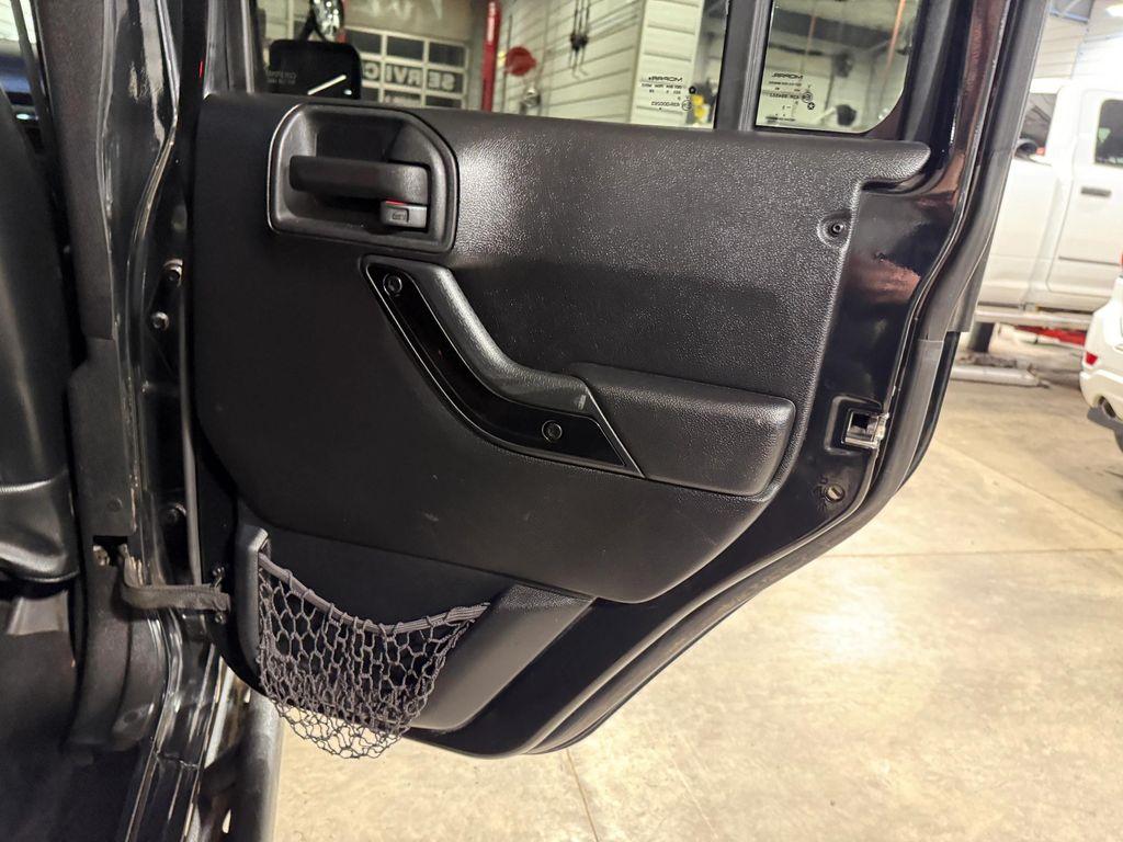 used 2015 Jeep Wrangler Unlimited car, priced at $13,538