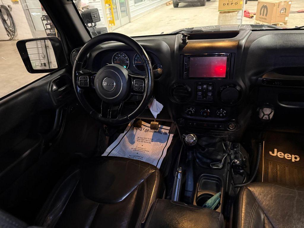 used 2015 Jeep Wrangler Unlimited car, priced at $13,538