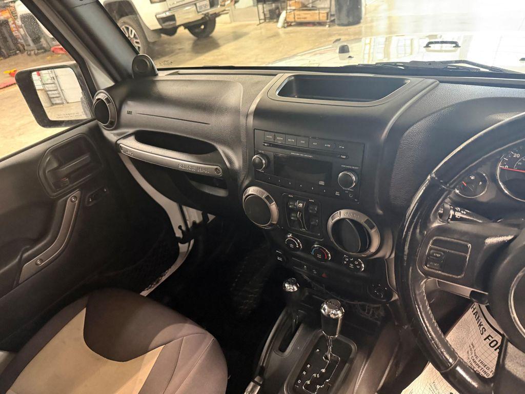 used 2014 Jeep Wrangler Unlimited car, priced at $18,566