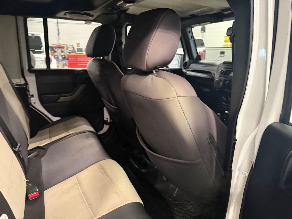 used 2014 Jeep Wrangler Unlimited car, priced at $18,566