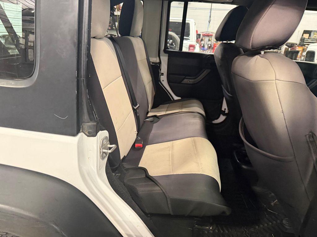 used 2014 Jeep Wrangler Unlimited car, priced at $18,566