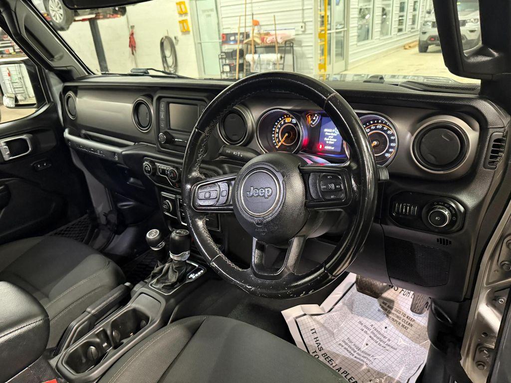 used 2021 Jeep Wrangler Unlimited car, priced at $34,887