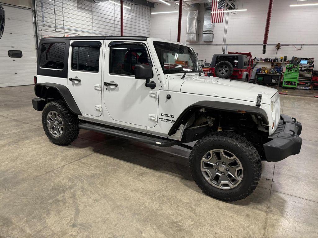 used 2013 Jeep Wrangler Unlimited car, priced at $17,500