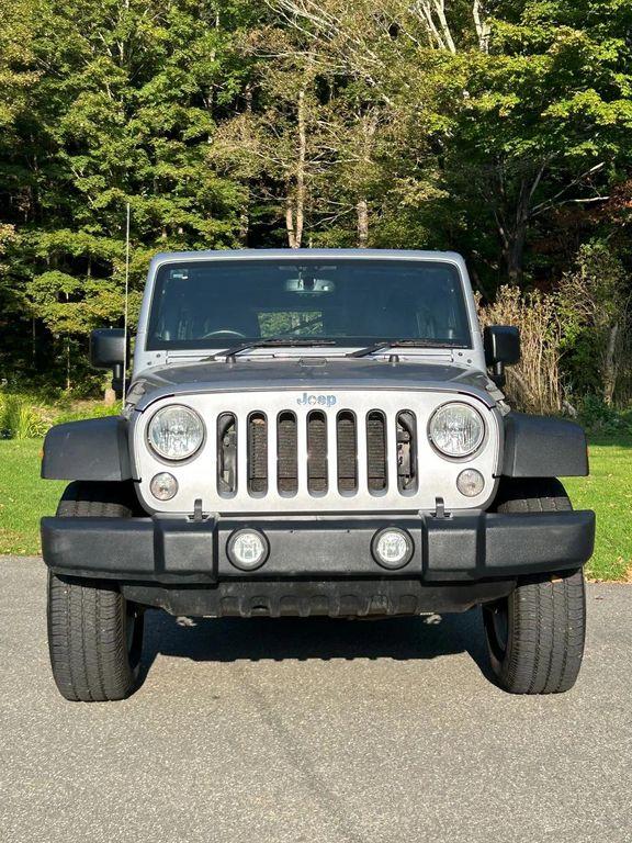 used 2014 Jeep Wrangler Unlimited car, priced at $19,366