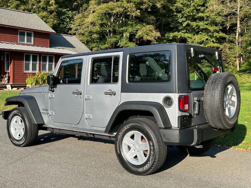 used 2014 Jeep Wrangler Unlimited car, priced at $19,366