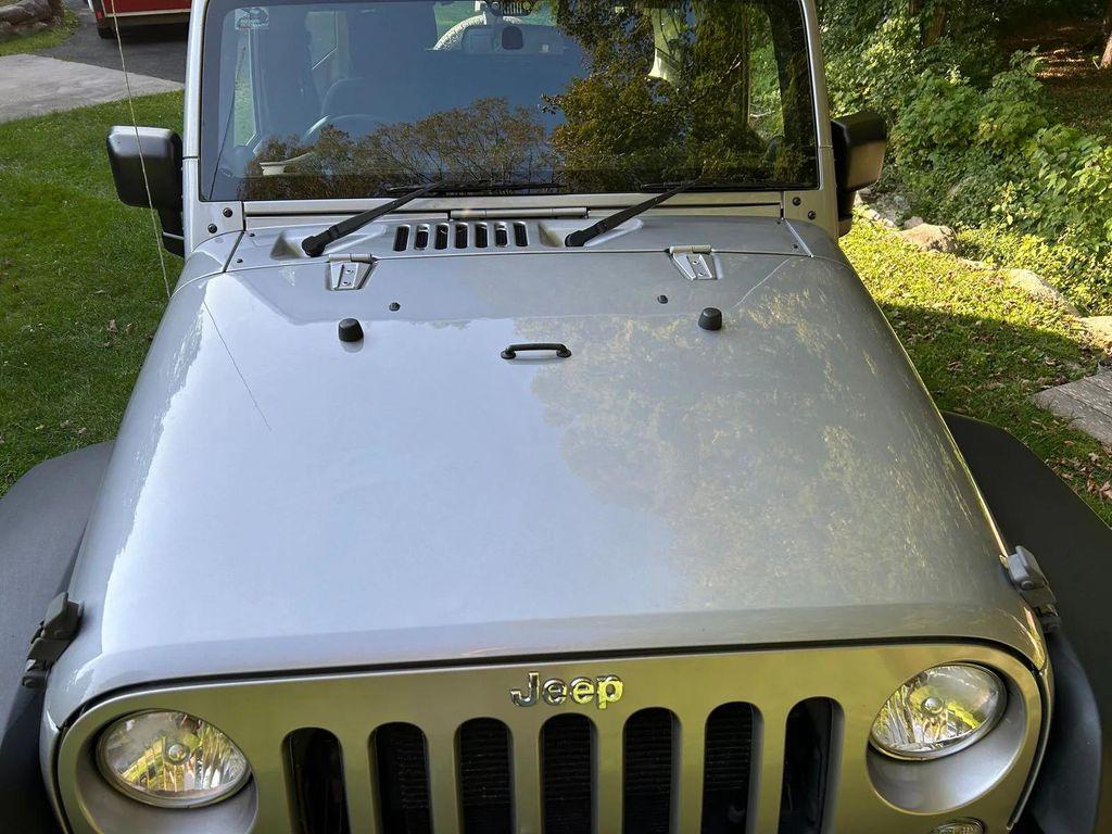 used 2014 Jeep Wrangler Unlimited car, priced at $19,366