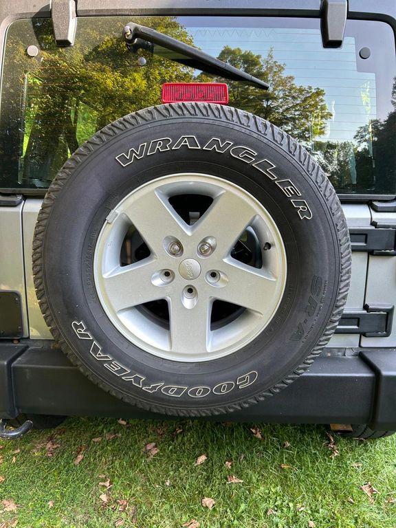 used 2014 Jeep Wrangler Unlimited car, priced at $19,366