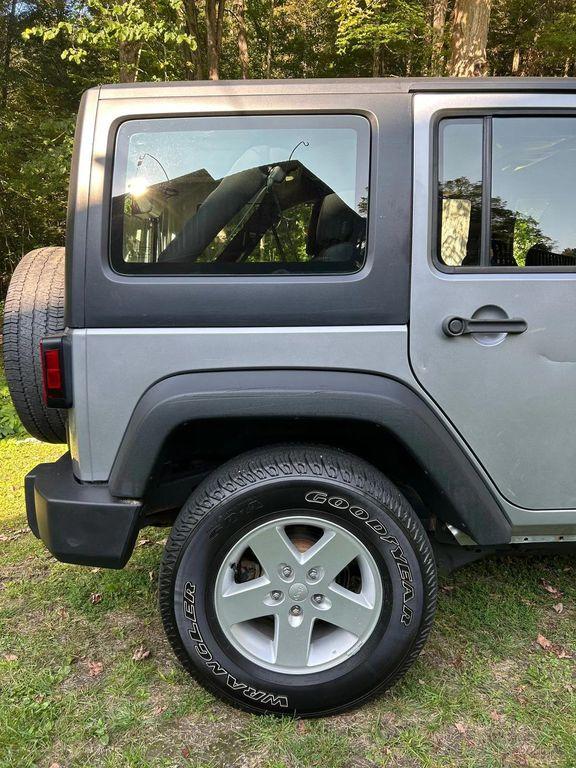 used 2014 Jeep Wrangler Unlimited car, priced at $19,366