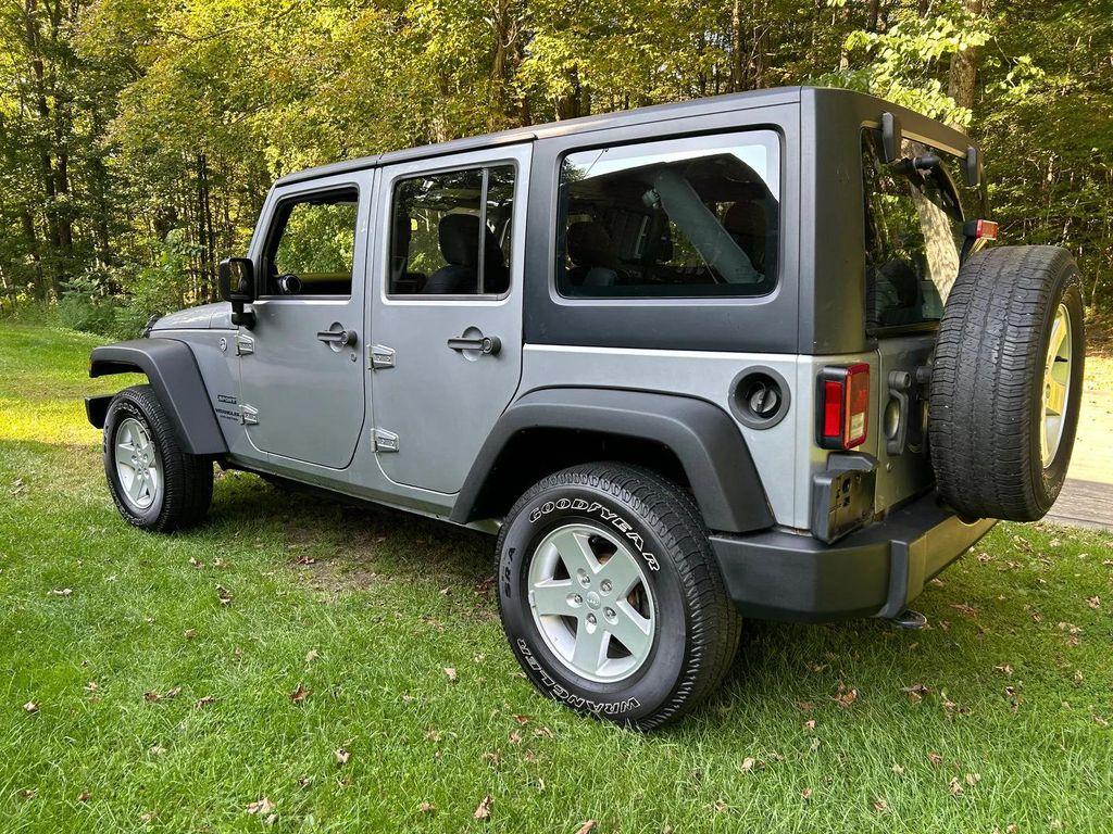 used 2014 Jeep Wrangler Unlimited car, priced at $19,366