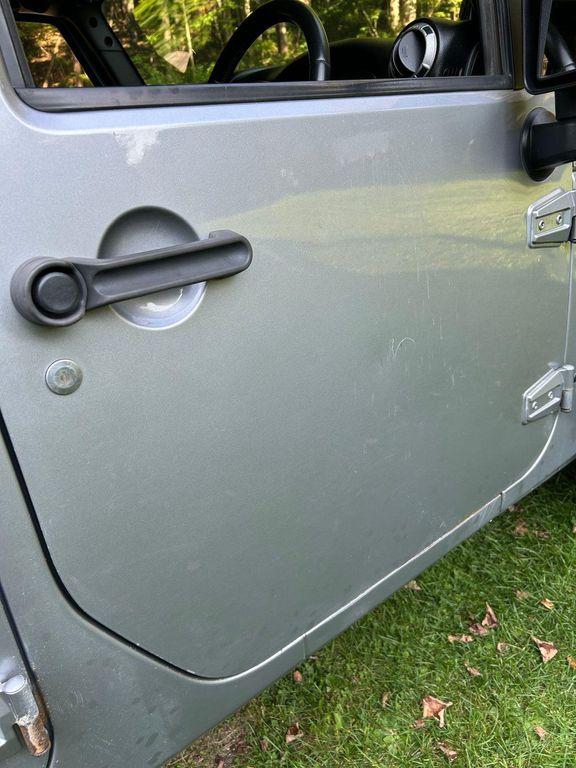 used 2014 Jeep Wrangler Unlimited car, priced at $19,366