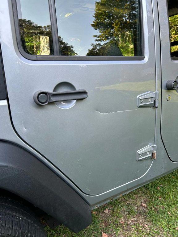 used 2014 Jeep Wrangler Unlimited car, priced at $19,366