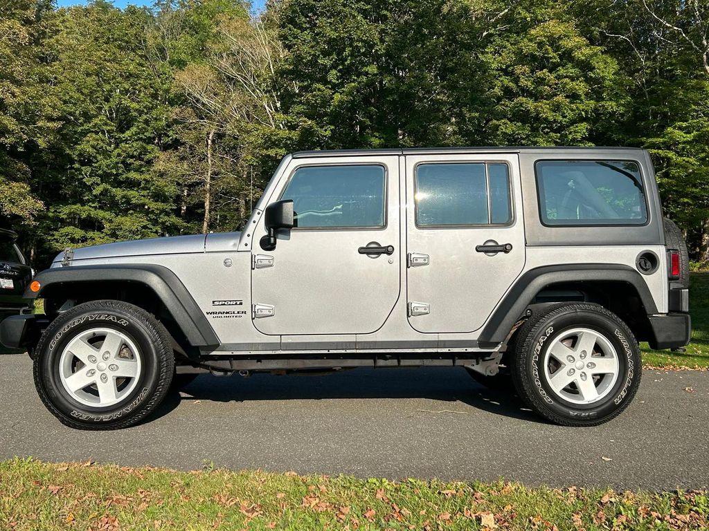 used 2014 Jeep Wrangler Unlimited car, priced at $19,366