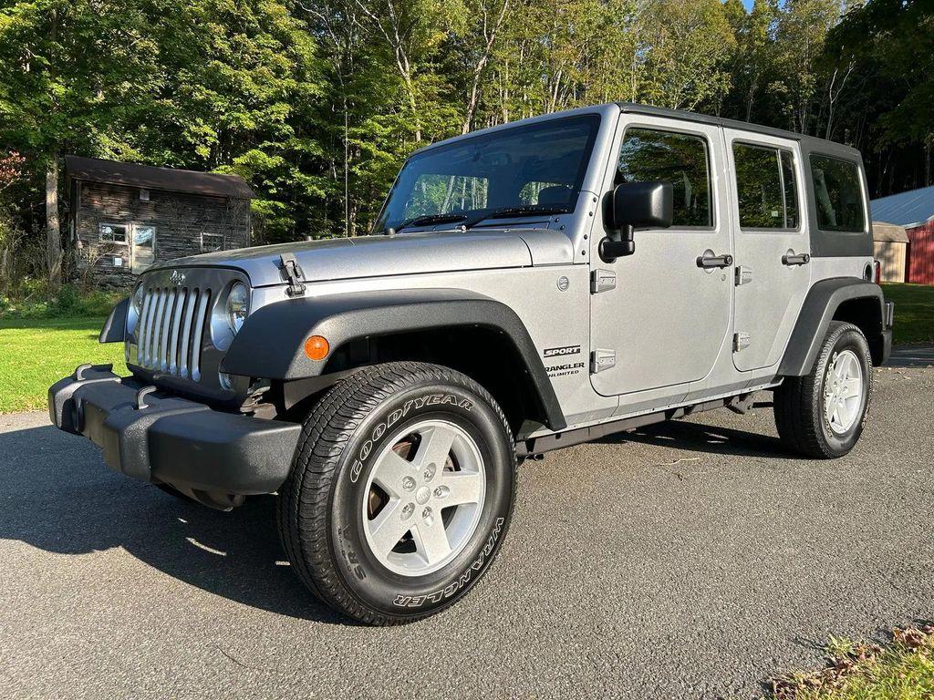 used 2014 Jeep Wrangler Unlimited car, priced at $19,366