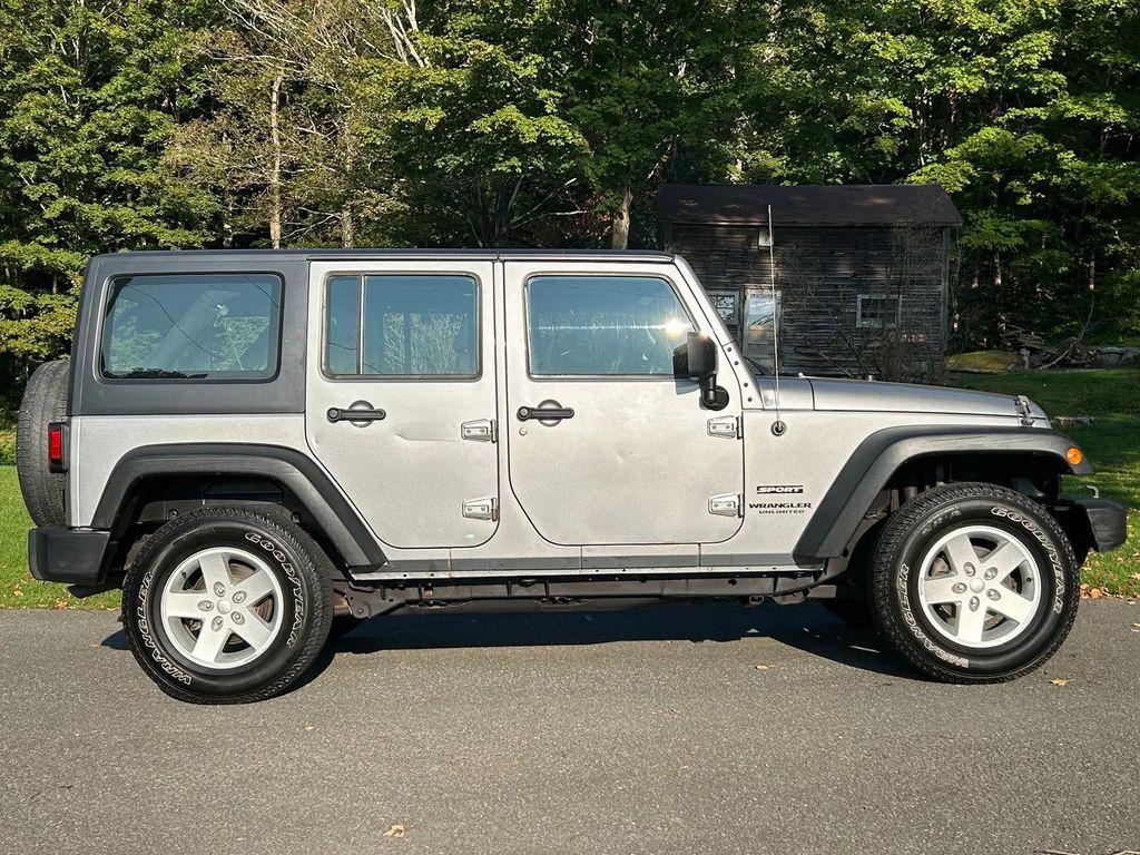 used 2014 Jeep Wrangler Unlimited car, priced at $19,366
